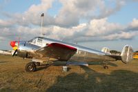 N1939K @ KOSH - Beech E18S - by Mark Pasqualino