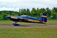 G-CBUA @ EGBP - Extra 230 [009] Kemble~G 11/07/2004 - by Ray Barber