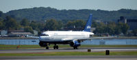 N656JB @ KDCA - Takeoff DCA - by Ronald Barker