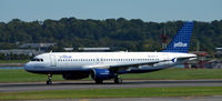 N656JB @ KDCA - Takeoff DCA - by Ronald Barker