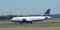 N656JB @ KDCA - Takeoff DCA - by Ronald Barker