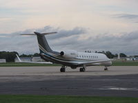 N905FL @ KOSH - Legacy 600 on the  Basler FBO ramp - by steveowen