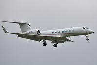 N119LE @ EGHH - Finals to 08 in mist and drizzle - by John Coates