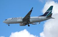 C-GWBN @ TPA - West Jet 737 - by Florida Metal