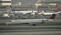 N609SK @ KLAX - TAxiing to gate - by Todd Royer