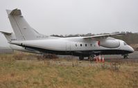 VP-CJD @ EGHH - Parked at JETS after arrival - by John Coates