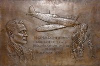 RW388 - Plaque at Potteries Museum & Art Gallery , commemorating local born Spitfire designer, 
R.J.Mitchell  and RW388 a 1945 Supermarine 361 Spitfire LF.XVIe, c/n: CBAF.IX.4646 example of the type - by Terry Fletcher
