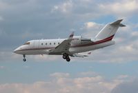 N877H @ ORL - Challenger 604 NBAA - by Florida Metal
