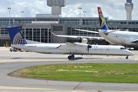 N332NG @ KIAD - Taxiing for departure - by Robert Kearney