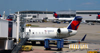 N8896A @ KDTW - At the gate, loading bags  Detroit - by Ronald Barker
