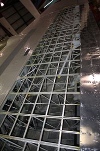 N5017N @ OSH - 1944 Boeing B-17G, c/n: 44-85740.  Left wing skins removed due to hail damage in Denver, CO - by Timothy Aanerud