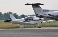 G-ROBN @ EGHH - Parked at DS Pilatus Centre - by John Coates
