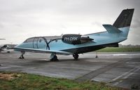 PH-DRK @ EGHH - A splash of colour at Sigs on a very grey day - by John Coates