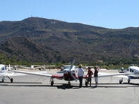 ZU-XML @ SZP - 2009 SA Ravin Aircraft CC RAVIN 500, Lycoming IO-540 260 Hp, 160 gal. in integral wing tanks+ferry tank, on Troll Air Round the World Flight, pilot Calle Hedberg with admirers - by Doug Robertson