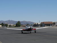 ZU-XML @ SZP - 2009 SA Ravin Aircraft CC RAVIN 500, Lycoming IO-540 260 Hp, based on concept of PA-24 COMANCHE but in composite, of Troll Air on Solo Round the World Flight, pilot Calle Hedberg, taxi back after landing Rwy 04 - by Doug Robertson
