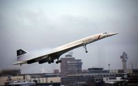 G-BOAC @ LHR - Taking off on a cool wet day at Heathrow, creating its own clouds over the wings. - by Murray Lundberg