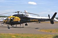 G-NTWK @ EGHH - Parked at Signatures - by John Coates