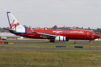 VH-BZG @ YSSY - taxi after landing on 34L - by Bill Mallinson