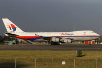 9M-MPS @ YSSY - taxi from 34L - by Bill Mallinson