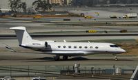 N673HA @ KLAX - Taxiing to parking at LAX - by Todd Royer
