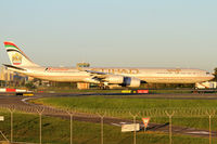 A6-EHH @ YSSY - taxiing off 34L - by Bill Mallinson