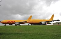EI-OZB @ EGBP - With EI-OZC for scrapping - by John Coates