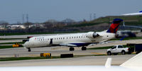 N134EV @ KORD - Taxi O'Hare - by Ronald Barker