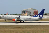 LN-RGG @ LMML - B737-800 LN-RGG SAS - by Raymond Zammit