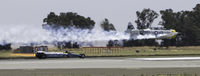 N1038A - N1038A racing the coinforce.com dragster at the 2011 Travis Air Show at Travis Air Force Base in Fairfield, CA - by Michael E Johnson