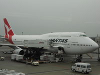 VH-OJS @ RJAA - After arrival in Narita as QF21 - by George Brown