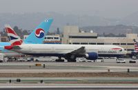 G-STBF @ KLAX - Boeing 777-300ER - by Mark Pasqualino