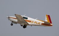 C-FLJL @ KOSH - Mooney M20J - by Mark Pasqualino