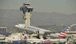 N750AN @ KLAX - Departing LAX on 25R - by Todd Royer