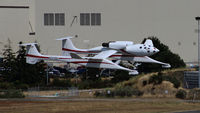 N318SL @ KPAE - Landing at KPAE after it's final flight - by Woodys Aeroimages