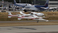 N318SL @ KPAE - Landing at KPAE after it's final flight - by Woodys Aeroimages