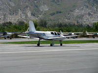 N52TH @ SZP - 1999 Hastings Cirrus Design VK-30, Continental IO-550 300 Hp pusher tri-blade prop, 34 kits were sold, this is first one flying after 9 year build. Ten are flying. Experimental class. Landing roll Rwy 22 - by Doug Robertson