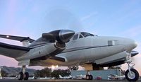 UNKNOWN @ KRHV - A brand new, rare, beautiful King Air 250 is started up and ready for departure during a stunning sunset at Reid-Hillview. No tail # as perp request of the aircraft owner. - by Chris L.