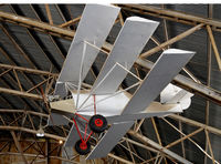 UNKNOWN @ KFTW - Aluminum triplane - by Ronald Barker