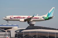 9Y-BGI @ MIA - Caribbean 737-800 - by Florida Metal