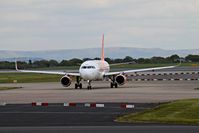 G-EZOE @ EGCC - taxing out to the runway for take off runway in use 05L - by andy-man-egcc