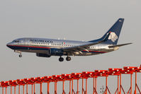 N904AM @ CYYZ - Landing in the early morning sun on 24R at Toronto Pearson. - by Robert Jones