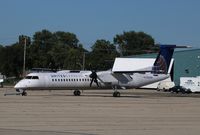N332NG @ KRFD - DHC-8-402 - by Mark Pasqualino
