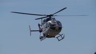 UNKNOWN @ KPAO - Some sort of helicopter landing on the dirt at Palo Alto Airport, Palo Alto, CA. Sorry, couldn't get a clear shot of the call sign. - by Chris Leipelt