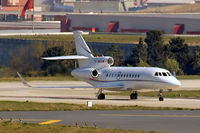 TC-MKR @ LTBA - Dassault Falcon 900LX [257] Istanbul-Ataturk~TC 16/04/2015. Taken through the glass of the hotel room. - by Ray Barber