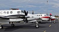 UNKNOWN @ KRHV - Two King Airs parked next to each other, both for a 49er football game at Reid Hillview Airport, San Jose, CA. One is a King Air 250 from Central California and one is a King Air 200 from Southern California. No tail numbers on aircraft as per request. - by Chris Leipelt