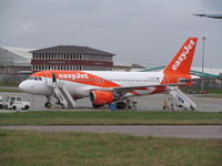 G-EZFO @ EGGW - luton based? - by magnaman