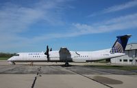G-PRPE @ KRFD - DHC-8-402Q - by Mark Pasqualino