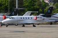 OE-GXL @ LSGG - Excel with shistership Phenom parked next to it in GVA. - by FerryPNL