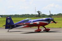 F-TGCJ @ LFOA - Extra EA-330SC, Taxiing to holding point rwy 24, Avord Air Base 702 (LFOA) Open day 2016 - by Yves-Q
