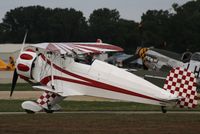N4937 @ KOSH - Bucker BU-133D-1 - by Mark Pasqualino